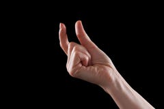 showing-small-thing-gesture-female-caucasian-hand-gesturing-amount-isolated-black-64626004.jpg